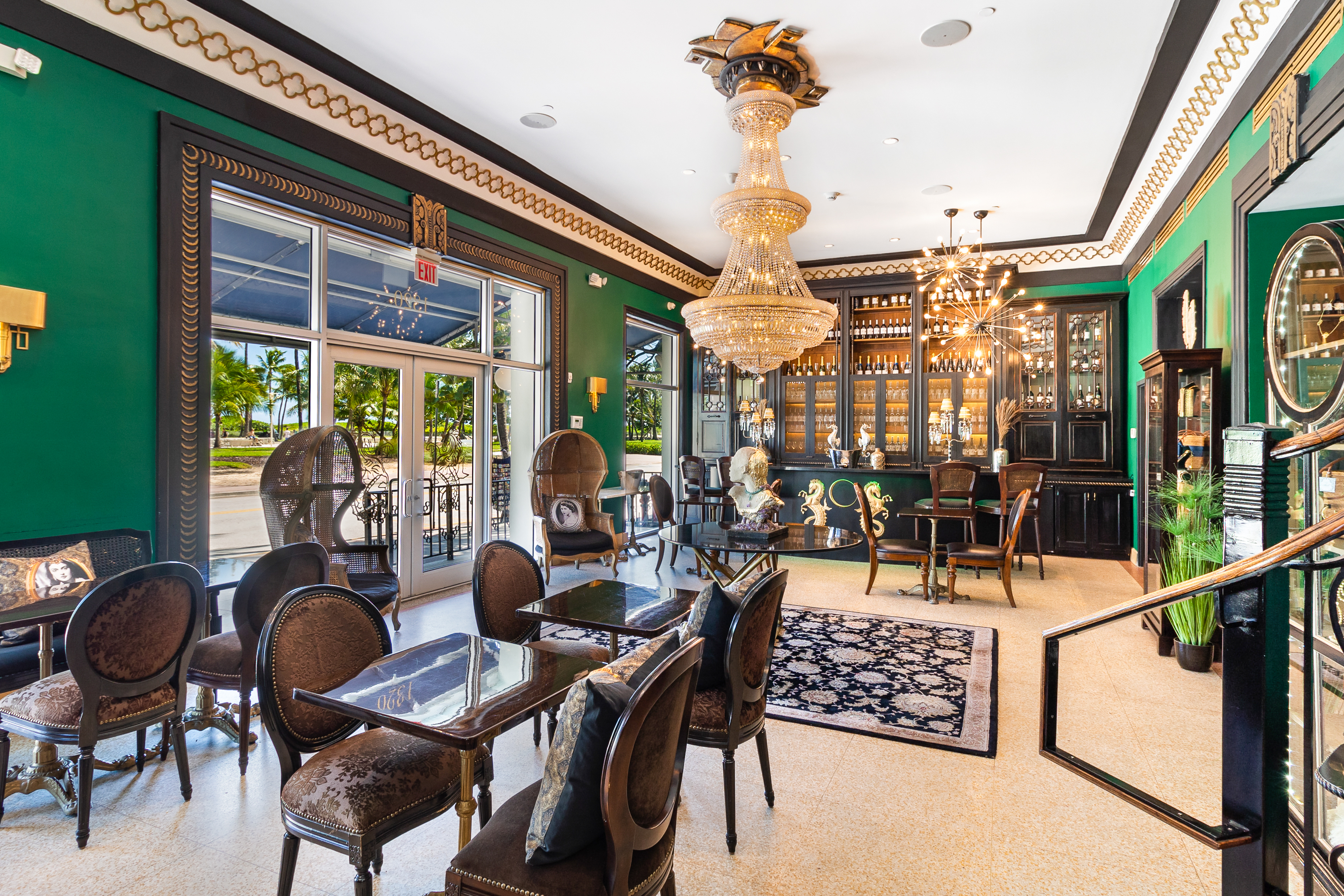A luxurious lobby with a bar and seating area